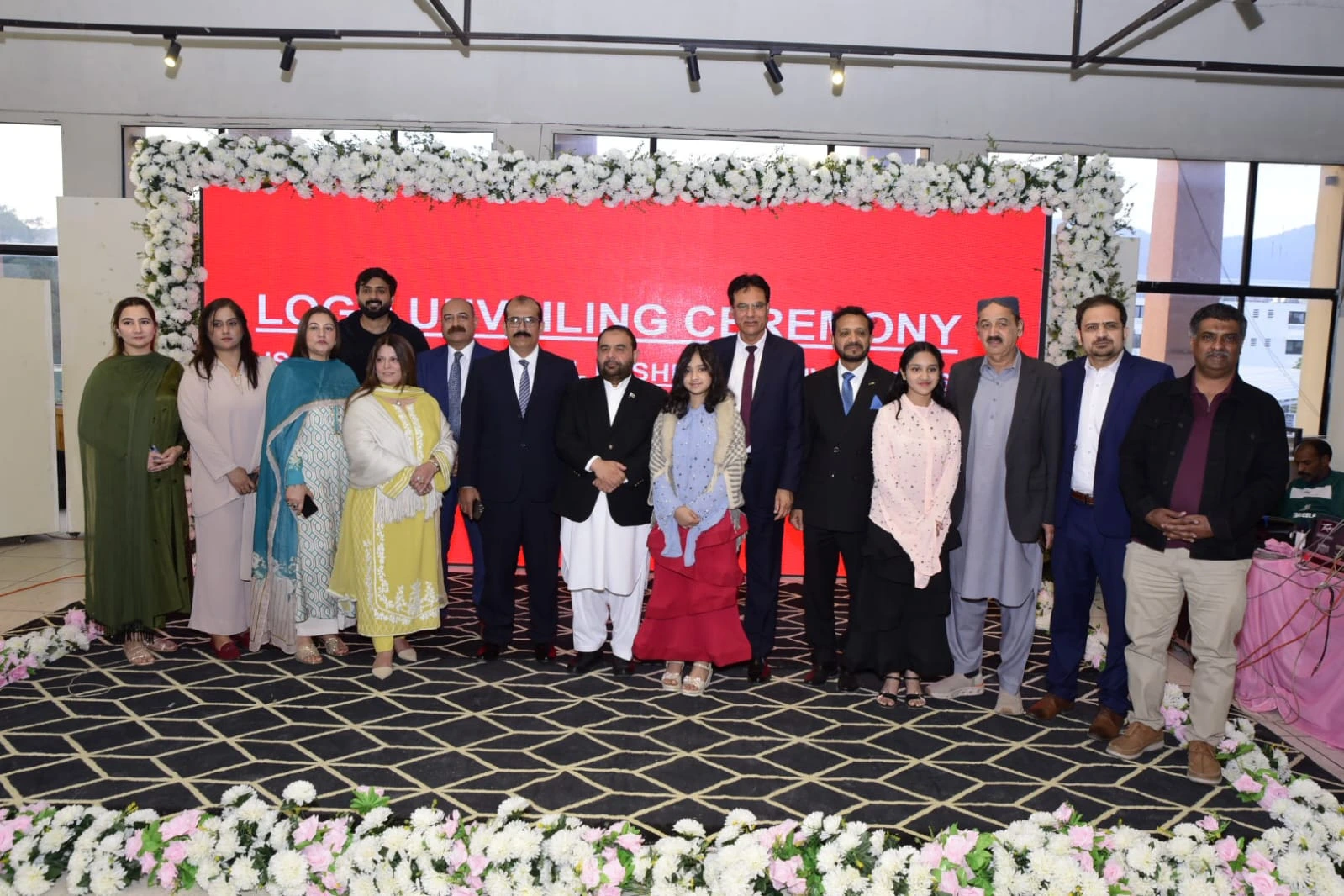 Group photograph taken during an official ceremony